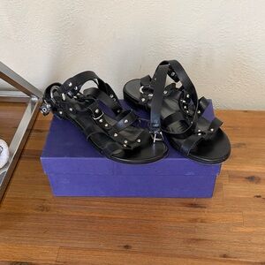 Stuart Weitzman Black Gladiator Sandals with Silver Accents